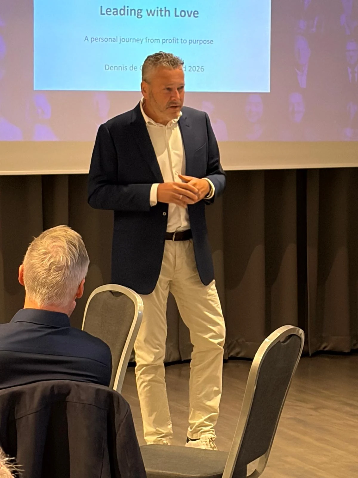 Dennis teaching at a gathering